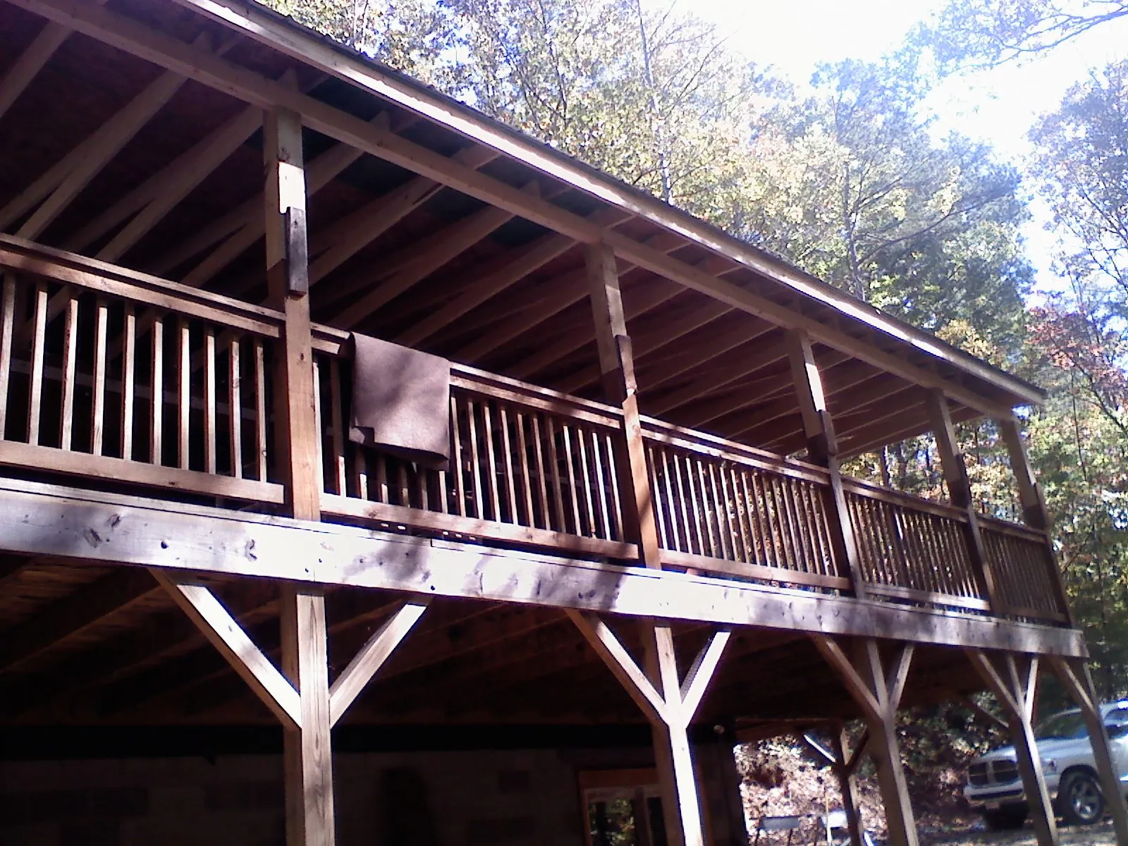 Timber framing under a new elevated porch and deck — Roof Leak Repair in Promise City by Roofing Brothers